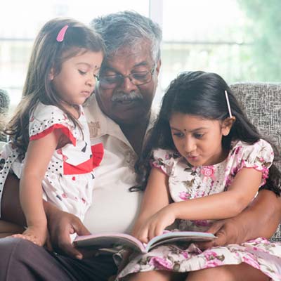 88119609-grandpa-grandfather-granddaughter-read-learn-book-story